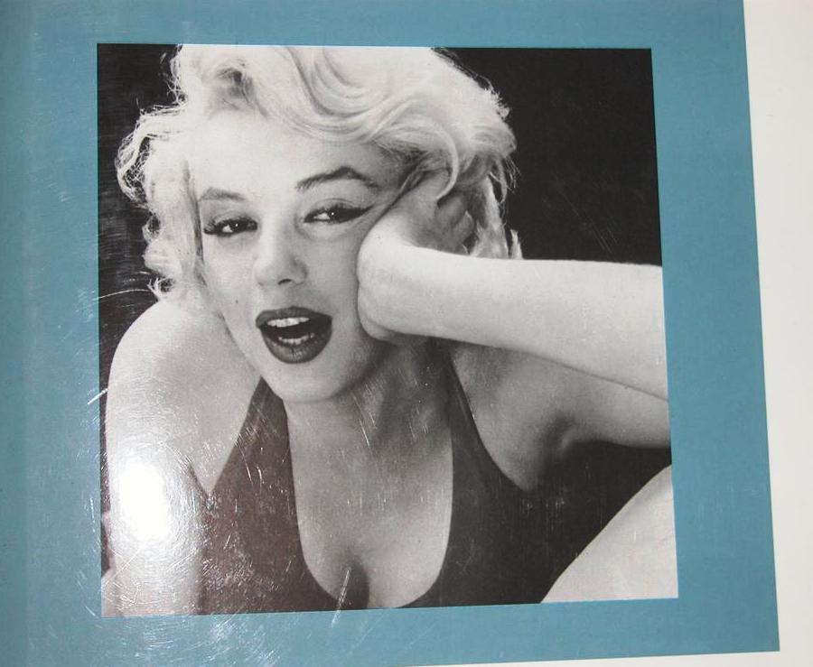 Book cover 19910015: BAKER Roger  | Marilyn Monroe - Photographs selected from the files of UPI/Bettmann.